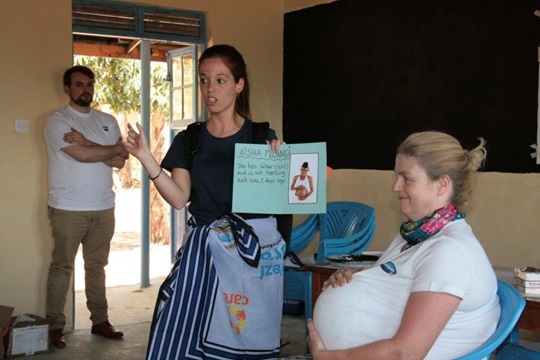 "Cristina Sansalvador doing a workshop with colleague Anna playing a pregnant woman."