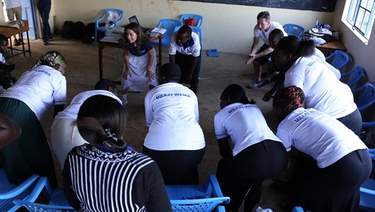 Elisa Pizzi doing hand hygiene workshop with healthcare professionals