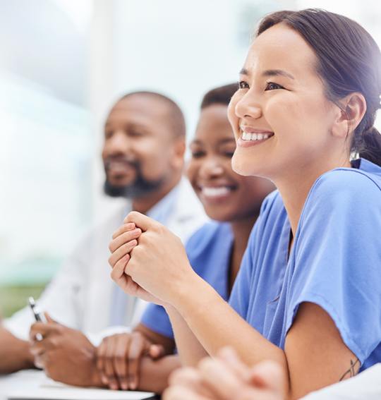 Healthcare professionals learning in a classroom