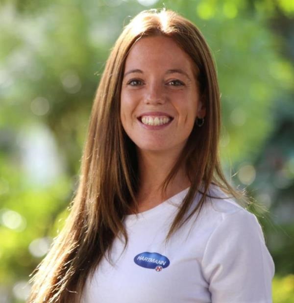 Portrait shot of Cristina Sansalvador smiling into the camera.