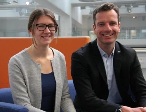 Franziska Seiler and Michael Wohlstein smiling into the camera"