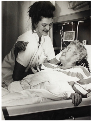Nurse helping an elderly patient