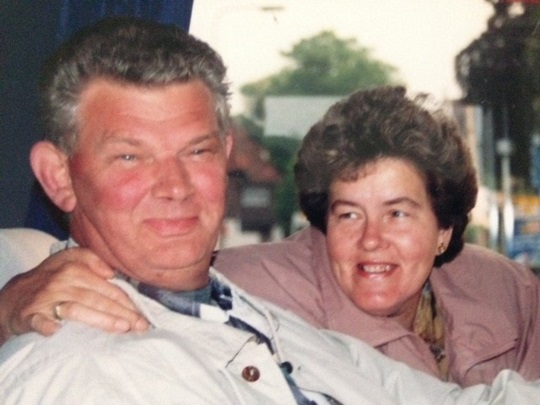 Elderly couple together smiling