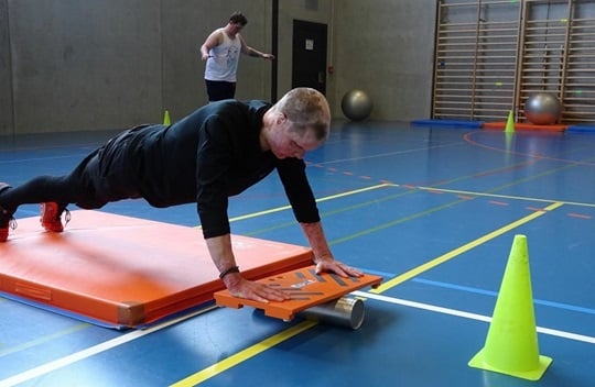 Philipp Bosshard doing exercises in the gym.