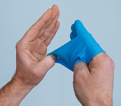 Handschuh ausziehen
