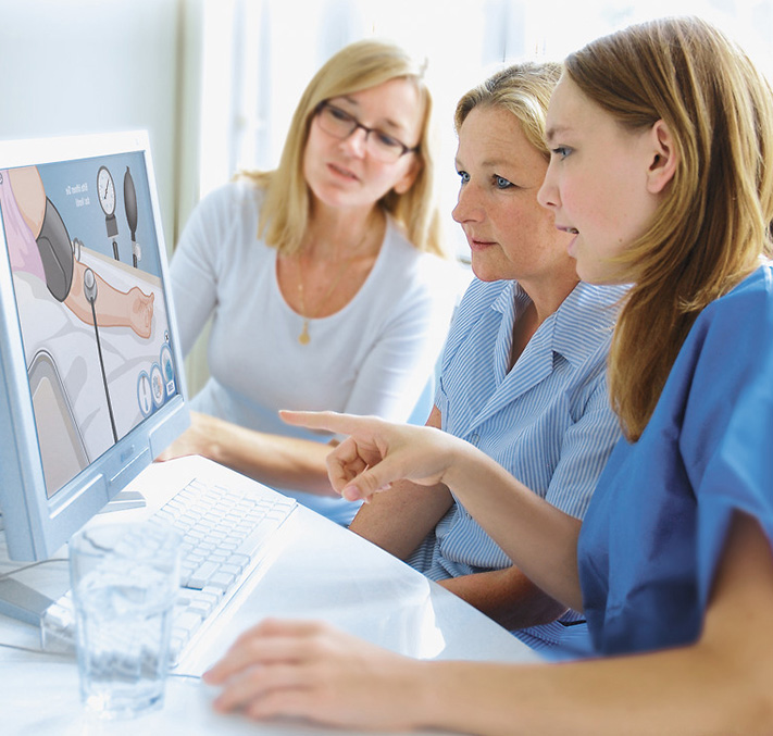 Woman in front of monitor
