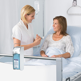 Desinfektionsspender am Krankenbett
