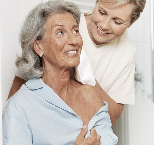 A nurse is treating a wound