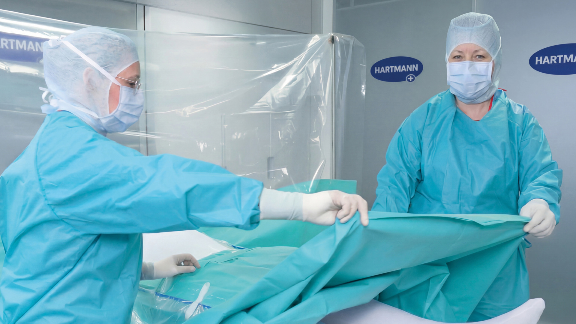 Nurses draping patient.