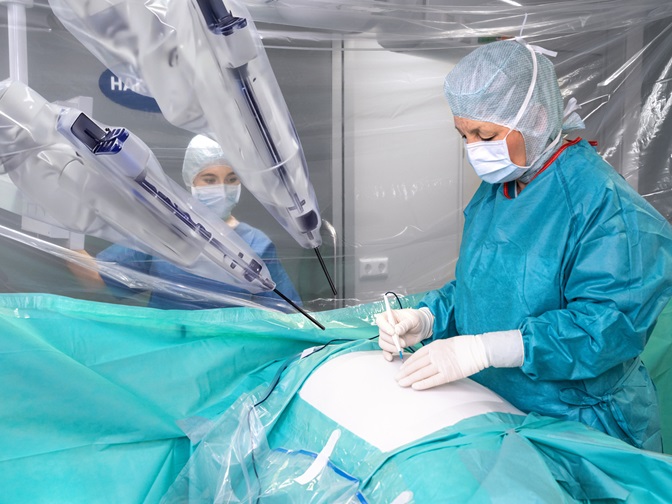 Female surgeon at Robotic Laparoscopy.
