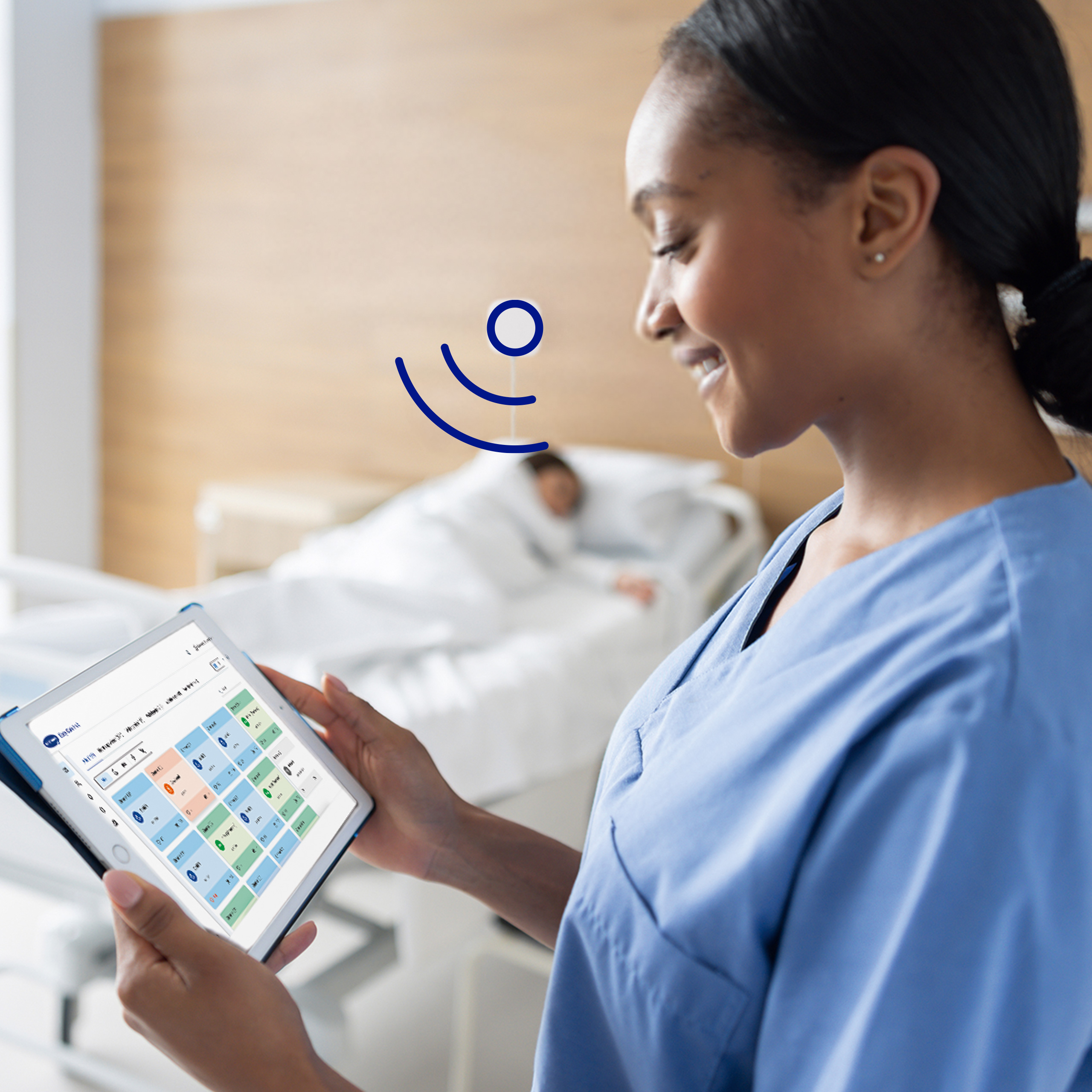 A nurse accessing patient information on a tablet via Easy Care Hub.