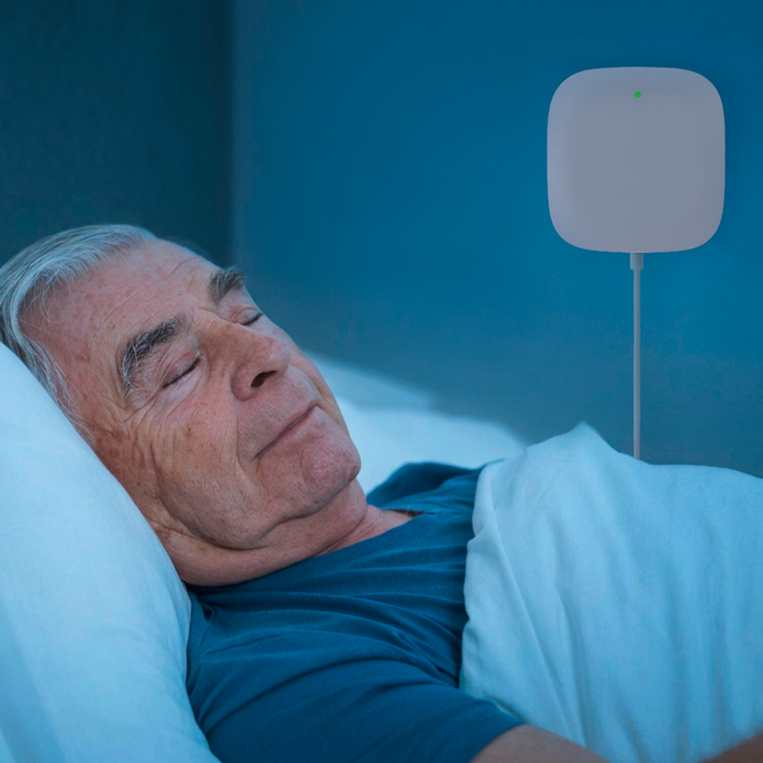 An elderly man sleeping in a bed.