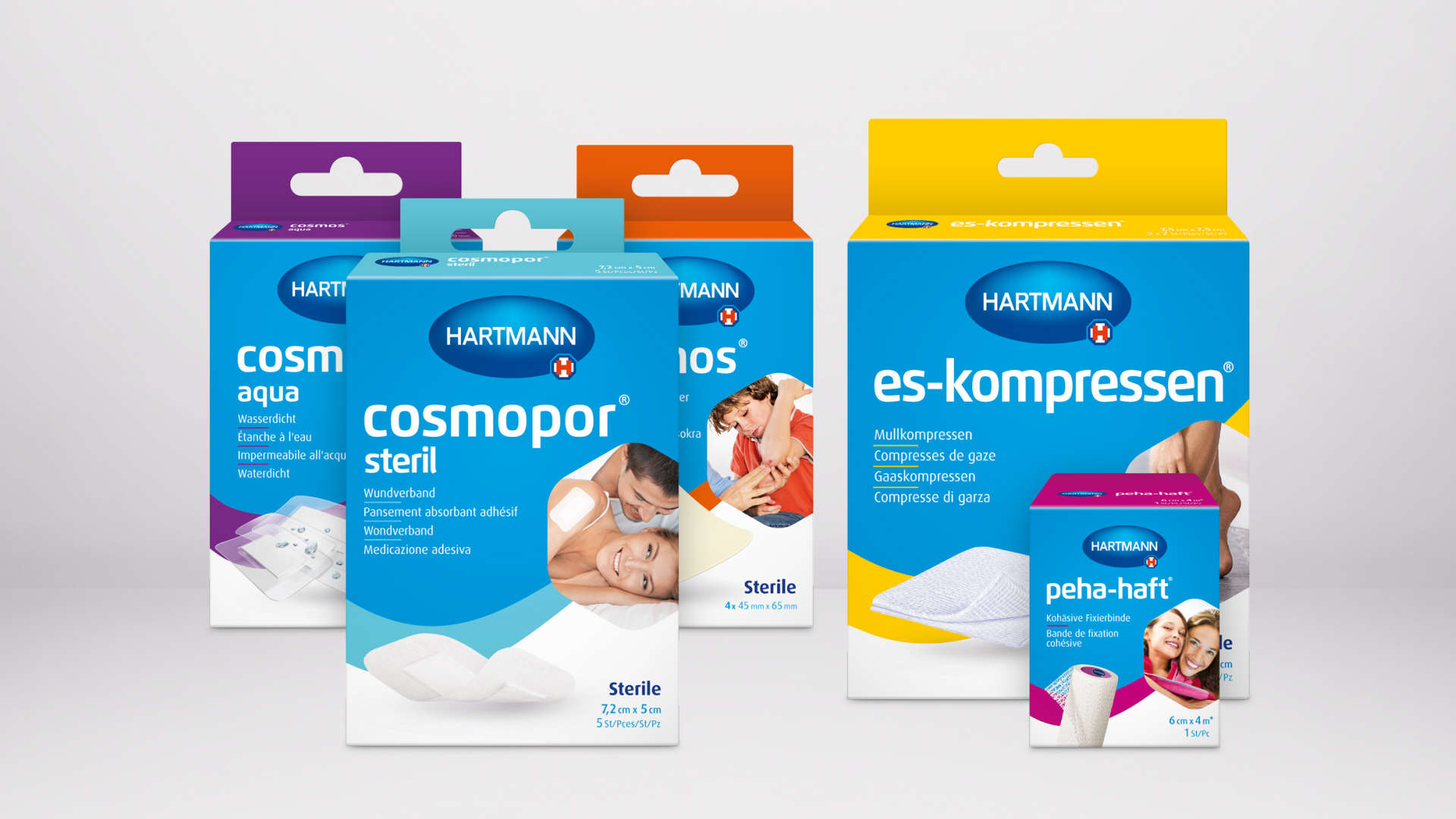 Various HARTMANN products for wound care lined up next to each other.