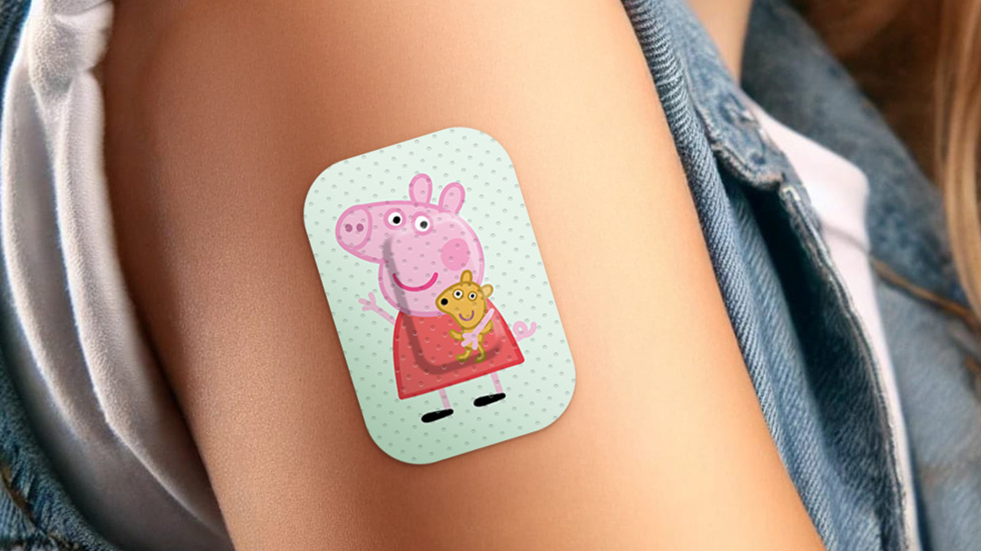 Pappa Pig am Oberarm eines Kindes