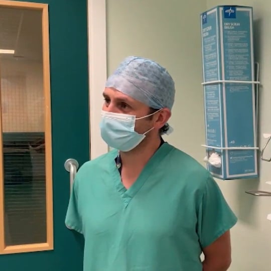 A photo of nurse Paul in a hospital.