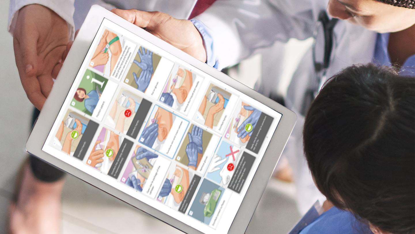 Tablet displaying detailed medical instructions, held by a person in a lab coat, viewed from above.