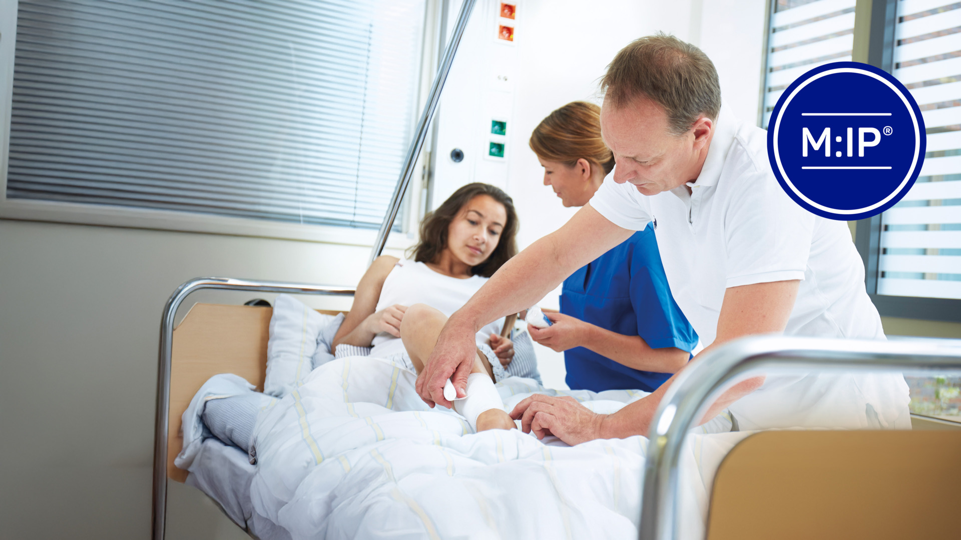  A healthcare professional tending to a patient in a modern hospital setting, showcasing the practical use of MIP medical solutions.