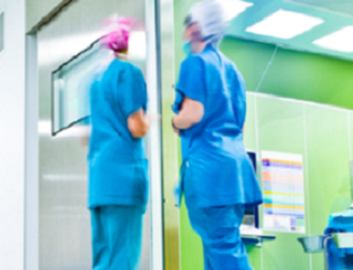 image of 2 doctors in a clinical environment