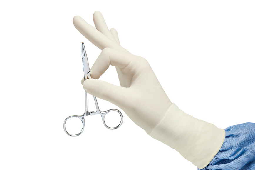 Image of hand with gloves on holding surgical tool with two fingers