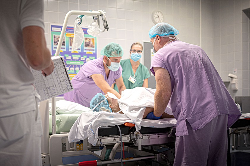 Nurses and patient during surgery in operating room