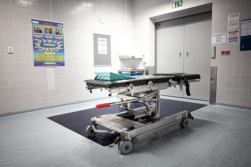 Image of empty operating room with sterile operating table