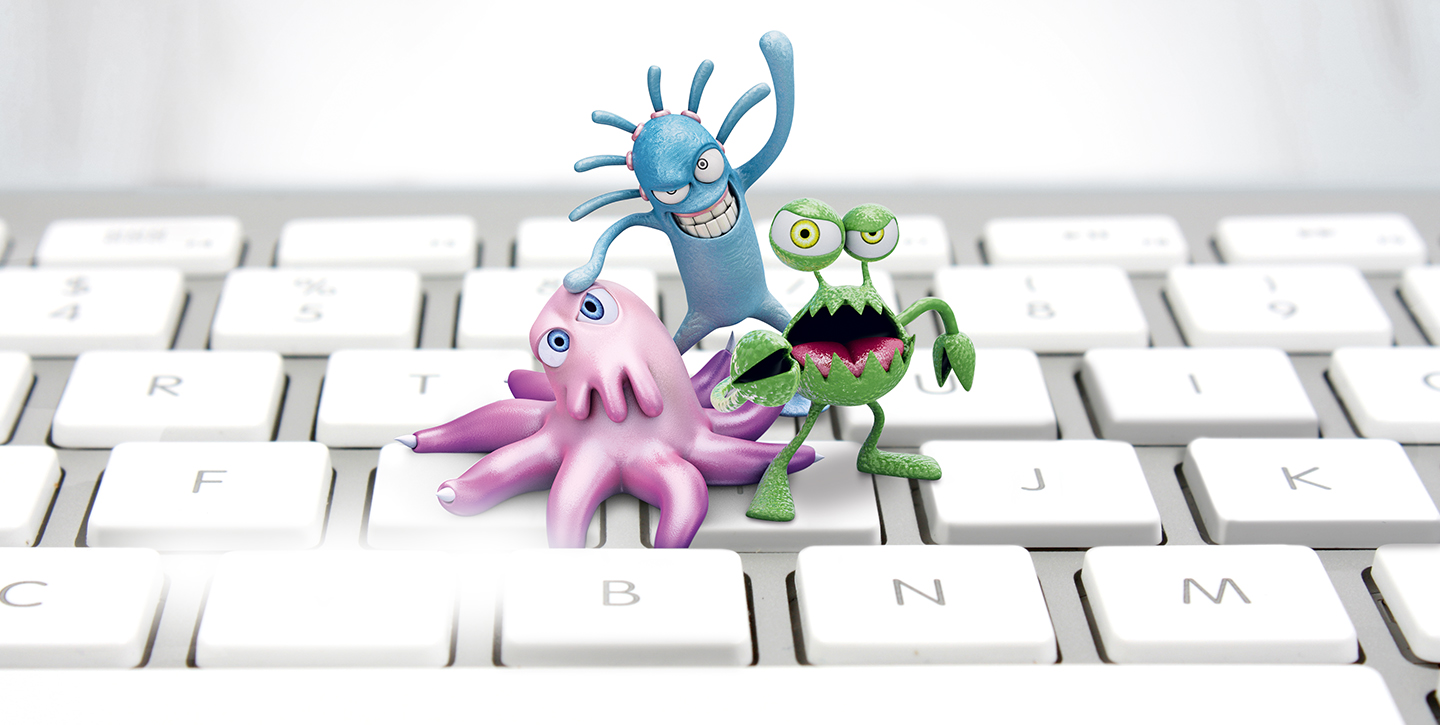 Drei illustrierte Figuren, die Keime darstellen sollen, auf einer angeschnittenen Computertastatur  