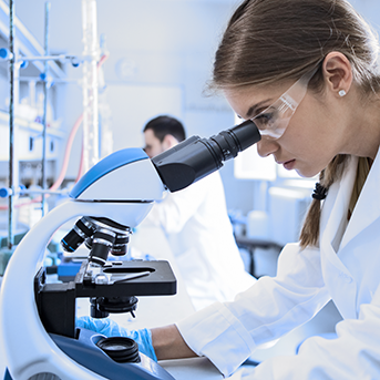 HARTMANN Science Center header - lab scientist performing research