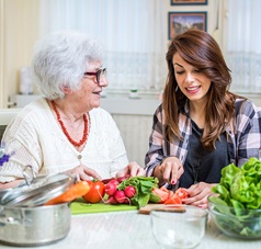 older woman with daughter at cooking