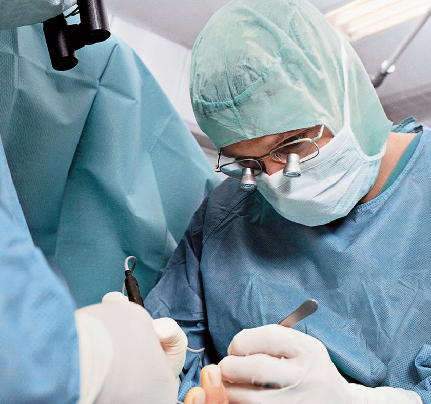 A surgeon is operating