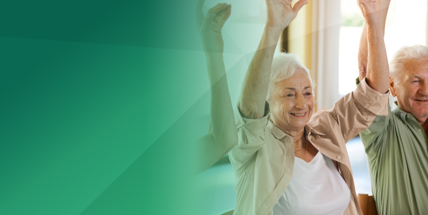 old woman happy and smiling, her hands are in the air