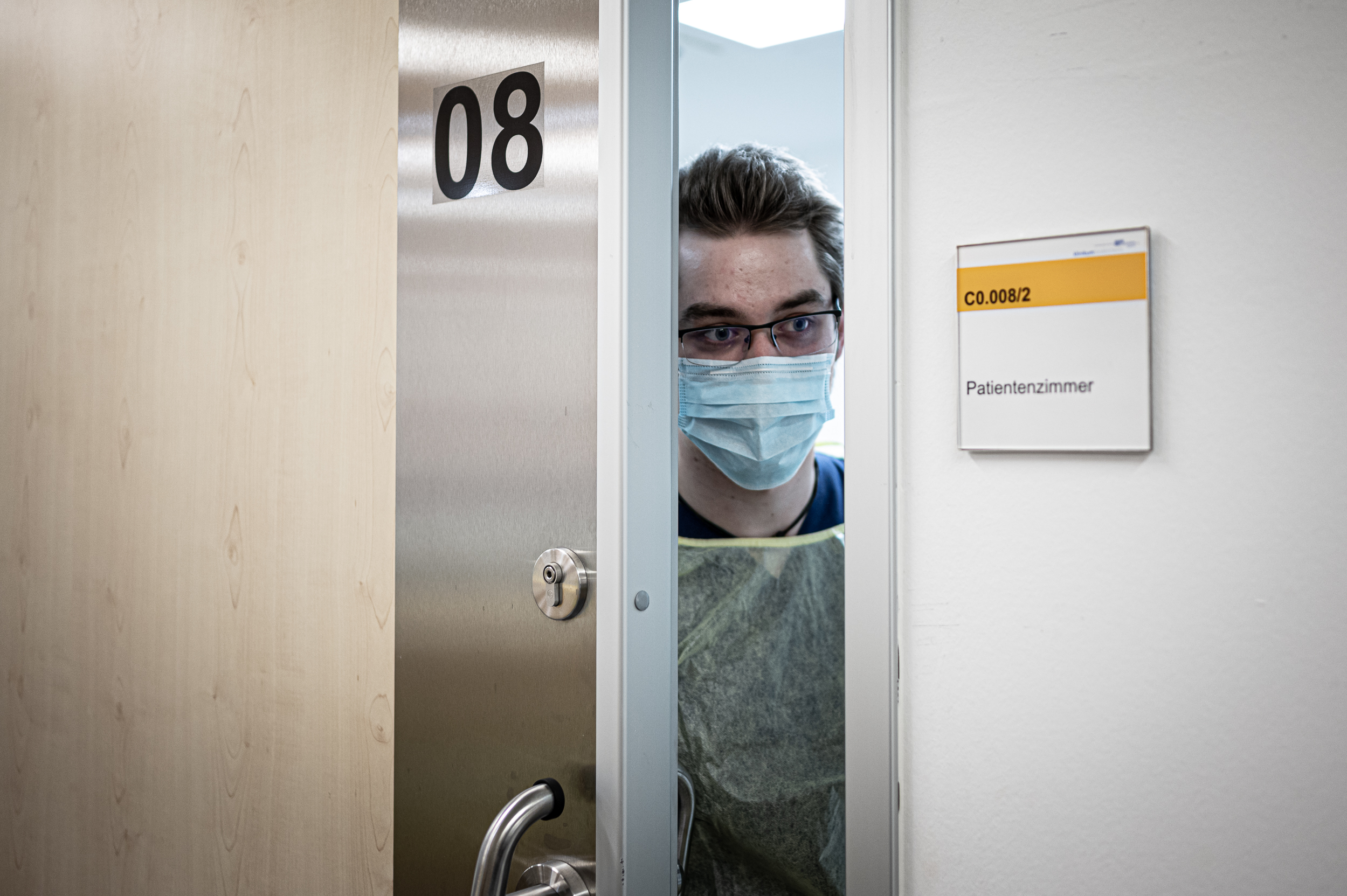 Doctor leaving patient room